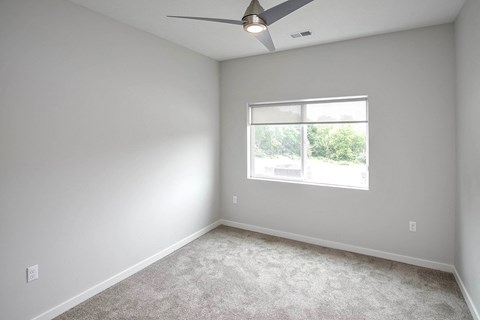 Spacious one and two-bedroom apartments featuring three interior schemes, granite countertops, stainless steel appliances, large kitchens, high-end lighting, vinyl plank flooring and much more at The Brink at Ridgeview in Plattsmouth, NE