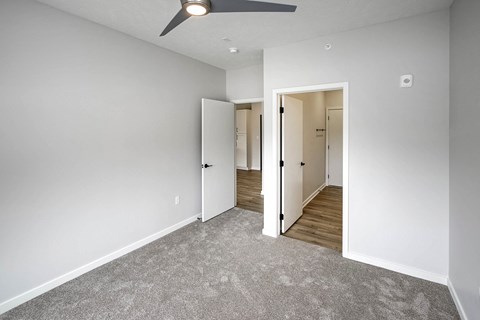 Spacious one and two-bedroom apartments featuring three interior schemes, granite countertops, stainless steel appliances, large kitchens, high-end lighting, vinyl plank flooring and much more at The Brink at Ridgeview in Plattsmouth, NE