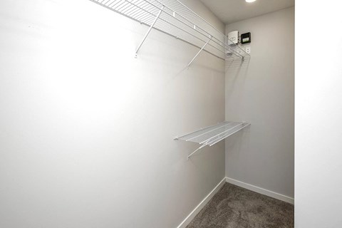 Spacious one and two-bedroom apartments featuring three interior schemes, granite countertops, stainless steel appliances, large kitchens, high-end lighting, vinyl plank flooring and much more at The Brink at Ridgeview in Plattsmouth, NE