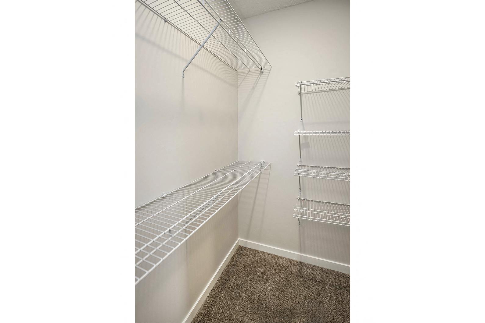 Spacious one and two-bedroom apartments featuring three interior schemes, granite countertops, stainless steel appliances, large kitchens, high-end lighting, vinyl plank flooring and much more at The Brink at Ridgeview in Plattsmouth, NE