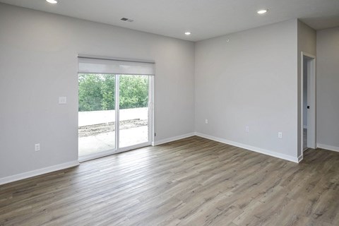 Spacious one and two-bedroom apartments featuring three interior schemes, granite countertops, stainless steel appliances, large kitchens, high-end lighting, vinyl plank flooring and much more at The Brink at Ridgeview in Plattsmouth, NE