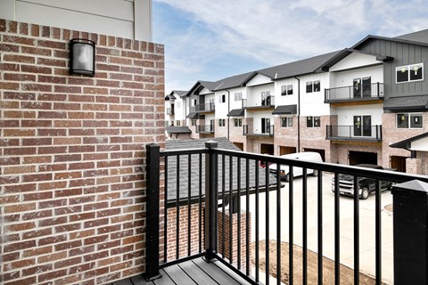 Spacious one and two-bedroom apartments featuring three interior schemes, granite countertops, stainless steel appliances, large kitchens, high-end lighting, vinyl plank flooring and much more at The Brink at Ridgeview in Plattsmouth, NE