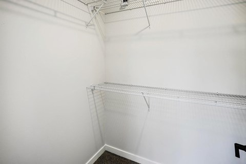 Spacious one and two-bedroom apartments featuring three interior schemes, granite countertops, stainless steel appliances, large kitchens, high-end lighting, vinyl plank flooring and much more at The Brink at Ridgeview in Plattsmouth, NE