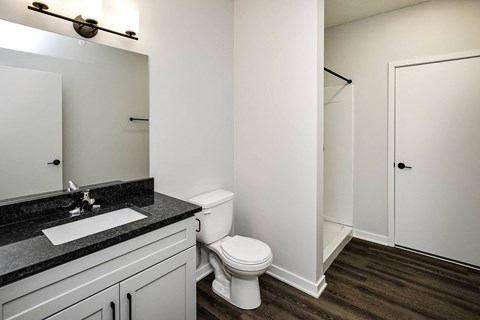 Spacious one and two-bedroom apartments featuring three interior schemes, granite countertops, stainless steel appliances, large kitchens, high-end lighting, vinyl plank flooring and much more at The Brink at Ridgeview in Plattsmouth, NE