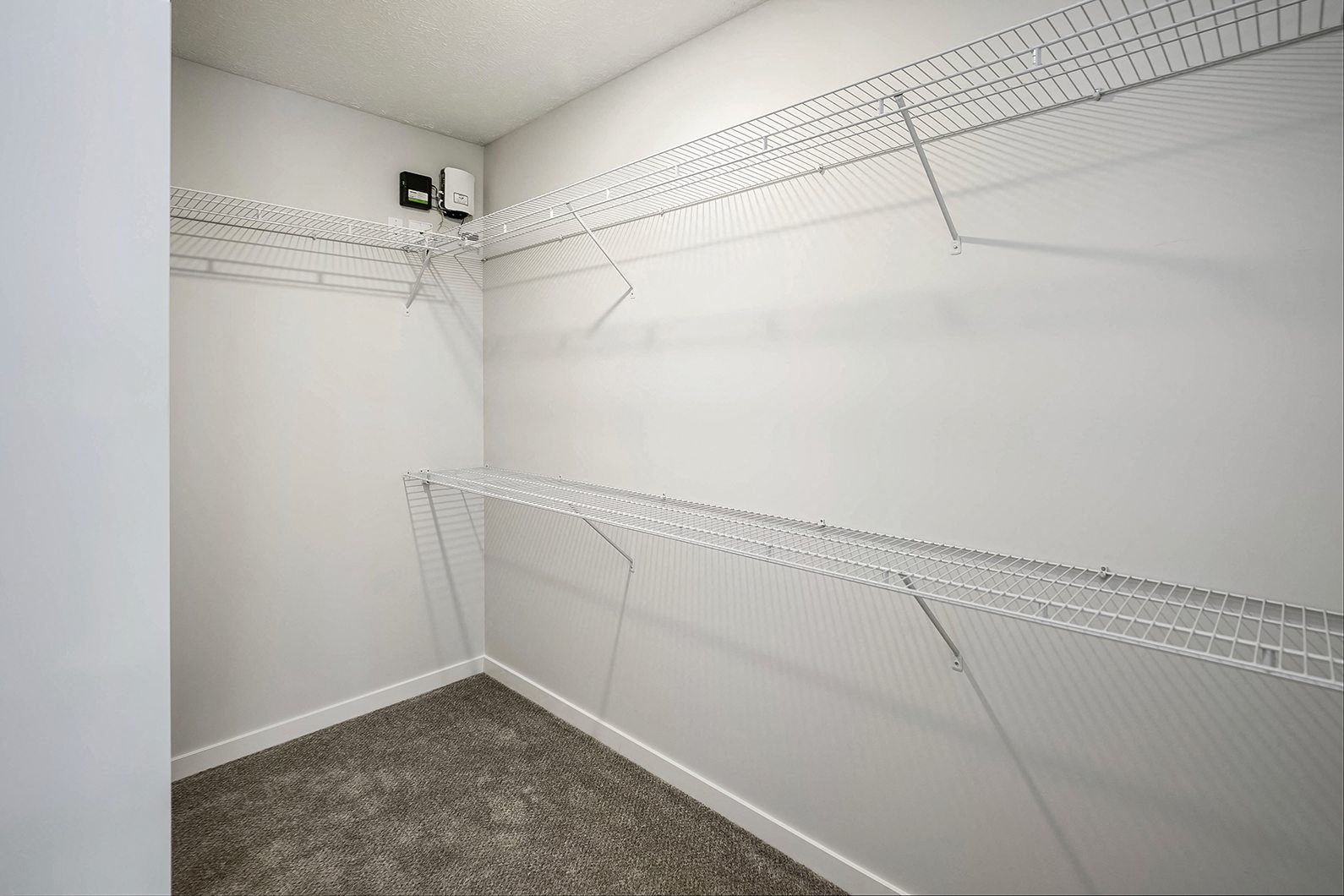 Spacious one and two-bedroom apartments featuring three interior schemes, granite countertops, stainless steel appliances, large kitchens, high-end lighting, vinyl plank flooring and much more at The Brink at Ridgeview in Plattsmouth, NE