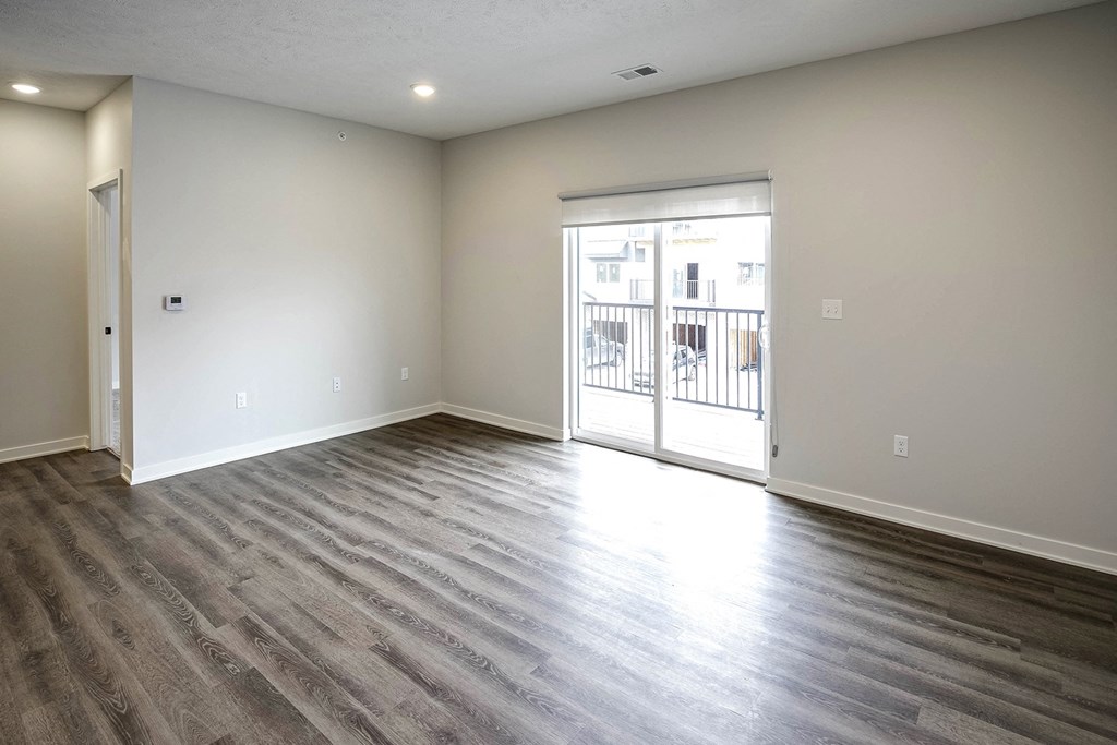 Spacious one and two-bedroom apartments featuring three interior schemes, granite countertops, stainless steel appliances, large kitchens, high-end lighting, vinyl plank flooring and much more at The Brink at Ridgeview in Plattsmouth, NE
