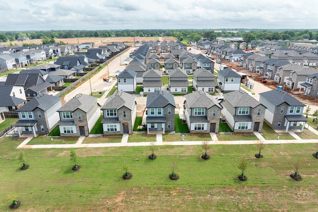 Two and three bedroom townhomes, villas, and mansions with top-of-the-line community and home amenities at The Grove in Rogers, AR