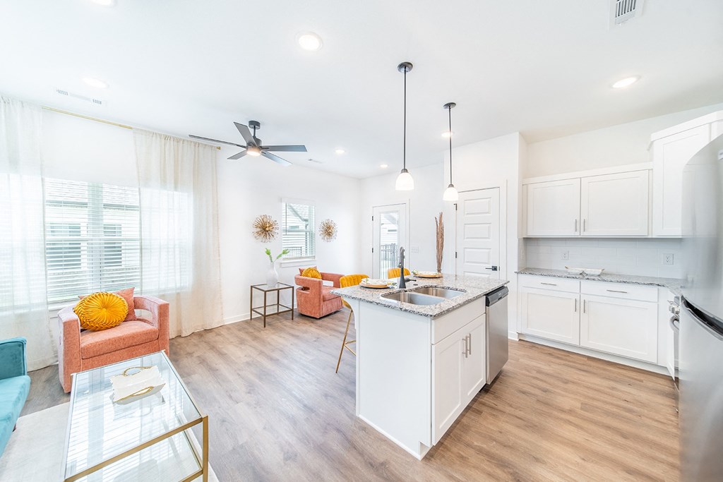 Living Room with premium lighting package at The Grove in Rogers, AR