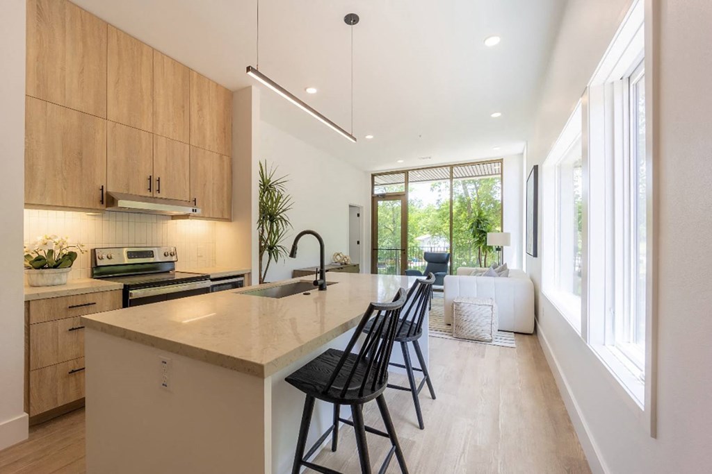 Studio, one and two bedroom apartment homes at The Howard East Central in Bentonville, AR