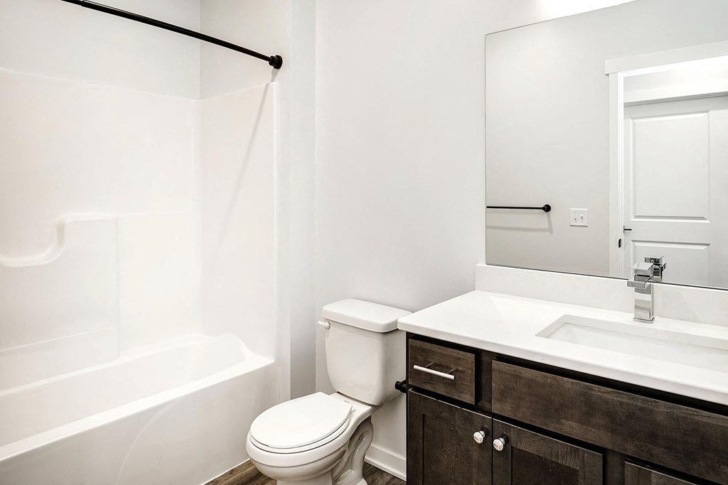 Modern one- and two-bedroom apartments featuring stainless steel appliances, high-end lighting, premium LVT flooring, granite countertops and more at The Ridgeline in Council Bluffs, IA