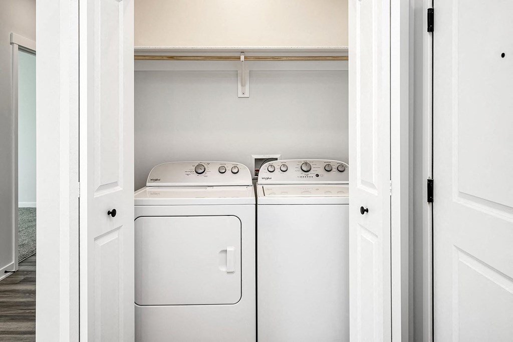 Modern one- and two-bedroom apartments featuring stainless steel appliances, high-end lighting, premium LVT flooring, granite countertops and more at The Ridgeline in Council Bluffs, IA