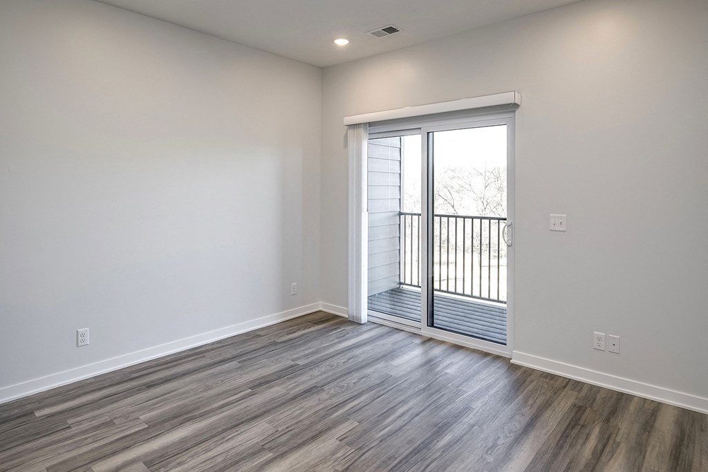 Modern one- and two-bedroom apartments featuring stainless steel appliances, high-end lighting, premium LVT flooring, granite countertops and more at The Ridgeline in Council Bluffs, IA