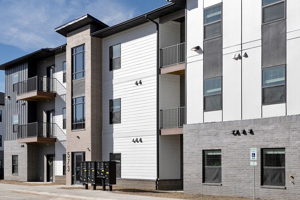 Modern one- and two-bedroom apartments featuring stainless steel appliances, high-end lighting, premium LVT flooring, granite countertops and more at The Ridgeline in Council Bluffs, IA