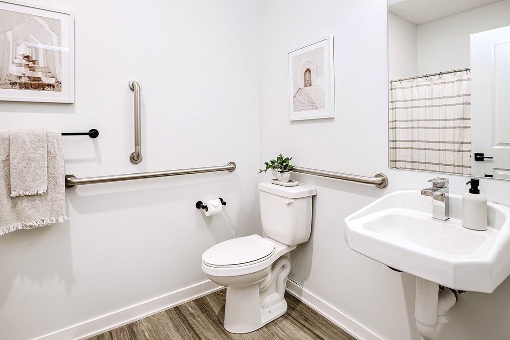 Modern one- and two-bedroom apartments featuring stainless steel appliances, high-end lighting, premium LVT flooring, granite countertops and more at The Ridgeline in Council Bluffs, IA