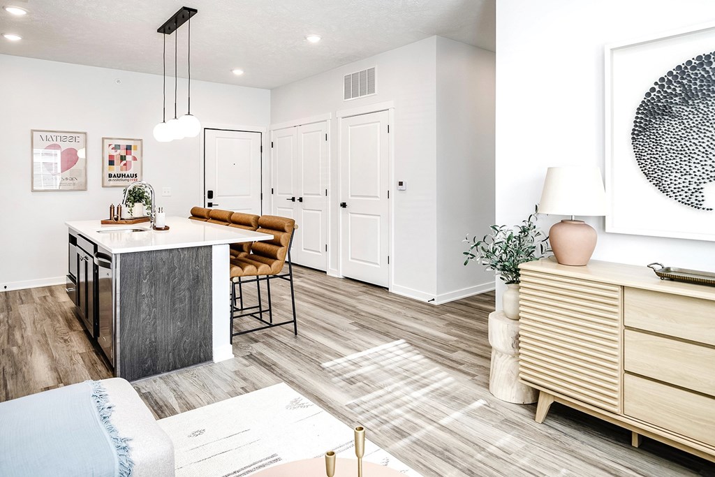 Modern one- and two-bedroom apartments featuring stainless steel appliances, high-end lighting, premium LVT flooring, granite countertops and more at The Ridgeline in Council Bluffs, IA