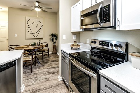Kitchen with stainless steel appliances at The Vue Apartments, Bellevue, Nebraska