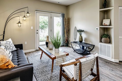 Living Room with glass sliding doors at The Vue Apartments, Bellevue, 68123
