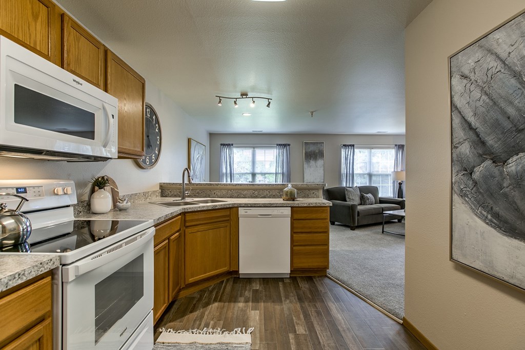 One, two and thee bedroom apartments featuring eat-in kitchens, large floor plans and amenities like heated pool, sundeck, fitness center and much more at Tranquility Pointe Apartments in Omaha, NE