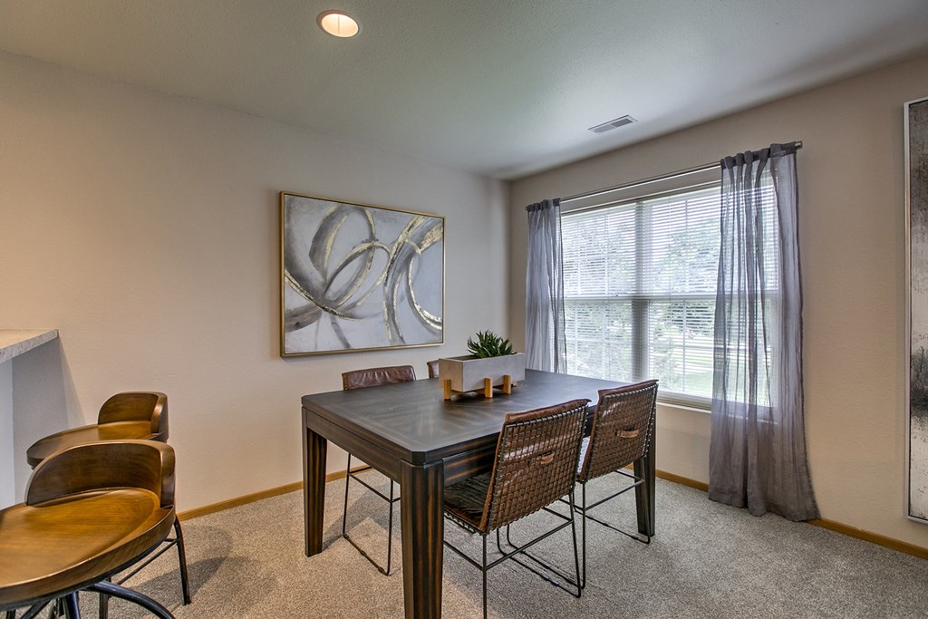 One, two and thee bedroom apartments featuring eat-in kitchens, large floor plans and amenities like heated pool, sundeck, fitness center and much more at Tranquility Pointe Apartments in Omaha, NE