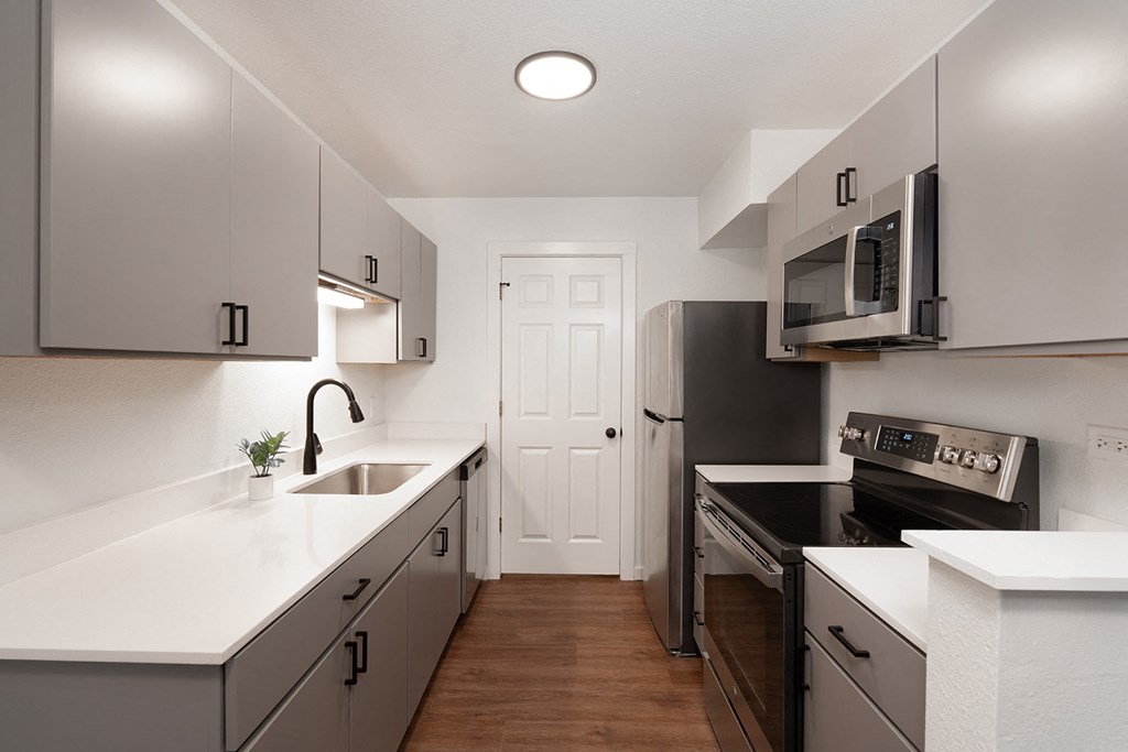 One and two bedroom apartment homes with custom quarts countertops, full size washer and dryer, premium appliance package, custom cabinetry package and lighting with close proximity to the University of Arkansas the newly renovated with historic charm Vineyards at Garland in Fayetteville, AR