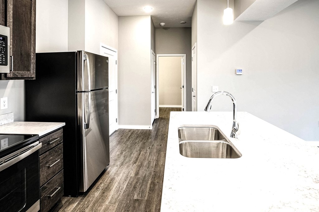 Kitchen with stainless steel appliances at Vue 178 in Omaha, NE