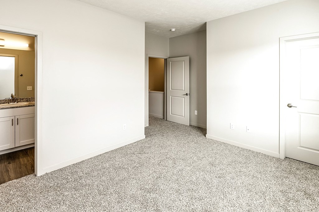 Bathroom attached with bedroom at Sandstone Villas Apartments, Omaha