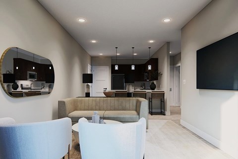 A modern living room with a grey sofa and a television.