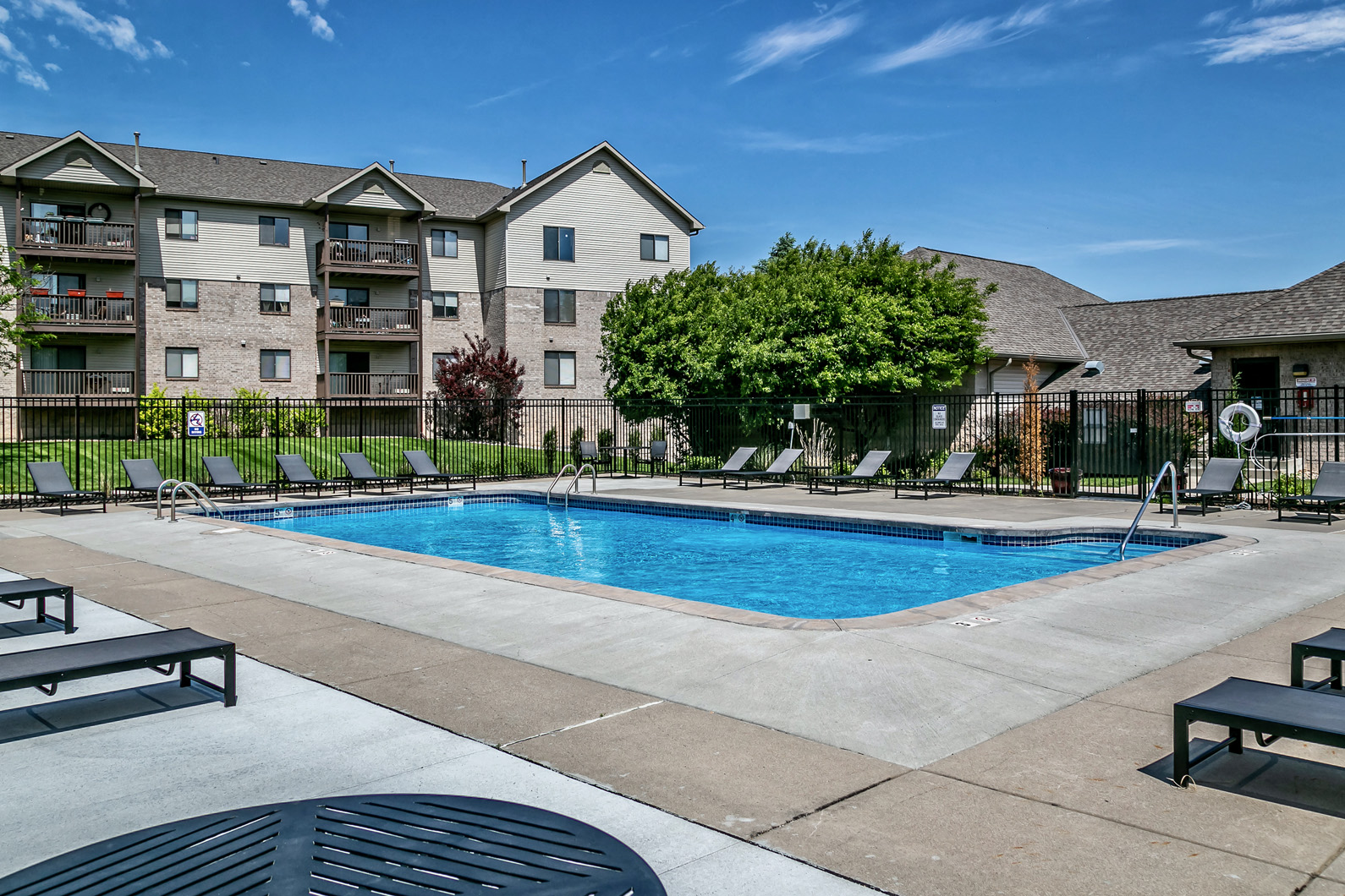 our apartments have a swimming pool and an apartment building