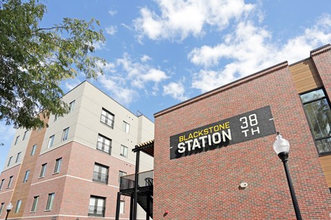 A brick building with a sign that says Blackstone Station.