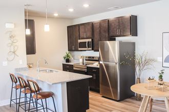 One and two bedroom apartment homes at The Sterling Prairie Trail North in Ankeny, IA