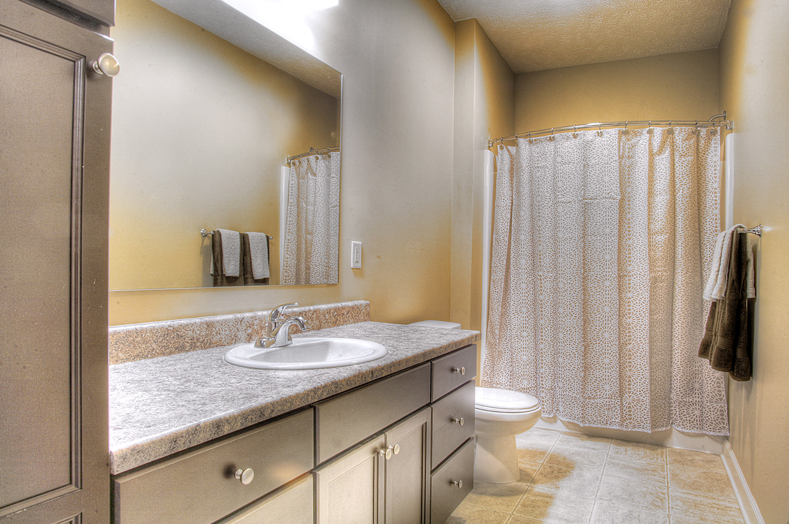 a bathroom with a sink and a toilet