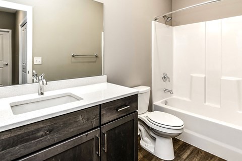 Studio, one two and three bedroom apartment homes featuring stainless steel appliances, luxury wood-style plank flooring, and in-unit washer and dryer in VUE 156 in Omaha, NE