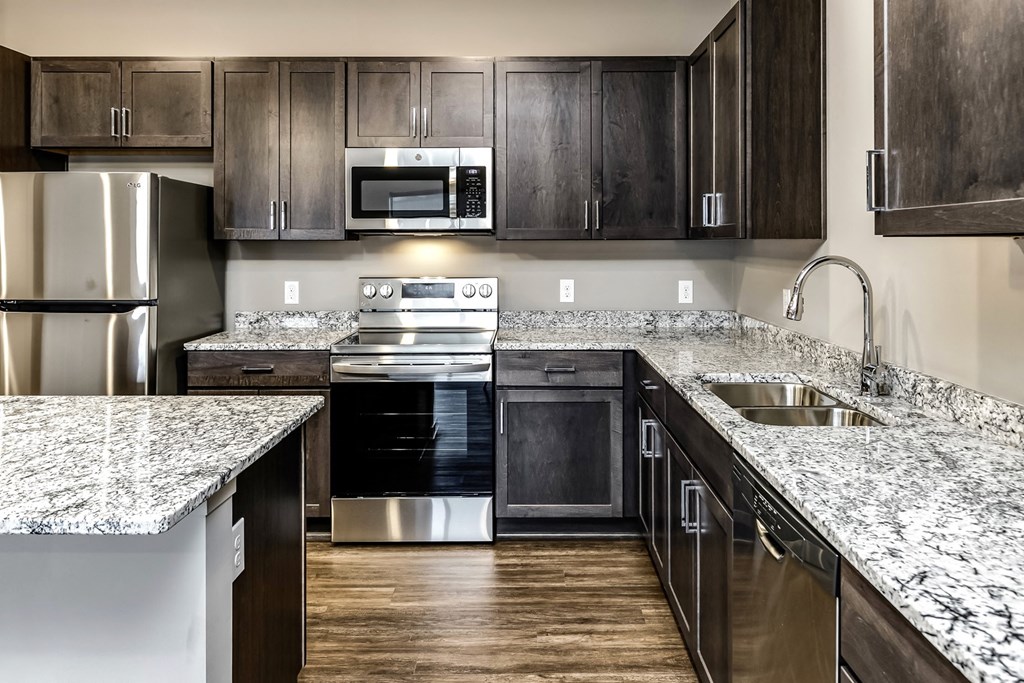 Dark cabinet countertops at LIV 156 Apartments in Omaha, NE