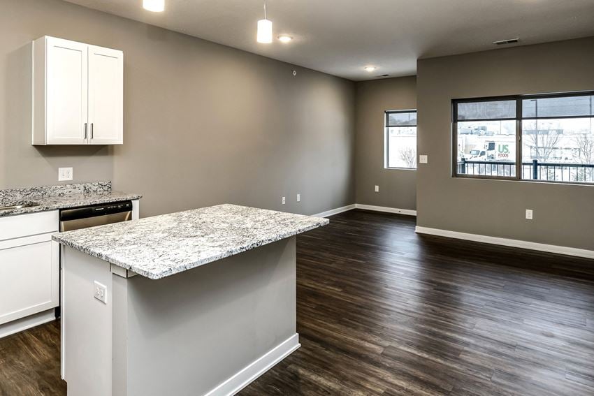 Open concept floor plans White cabinet countertops at LIV 156 Apartments in Omaha, NE - Photo Gallery 1