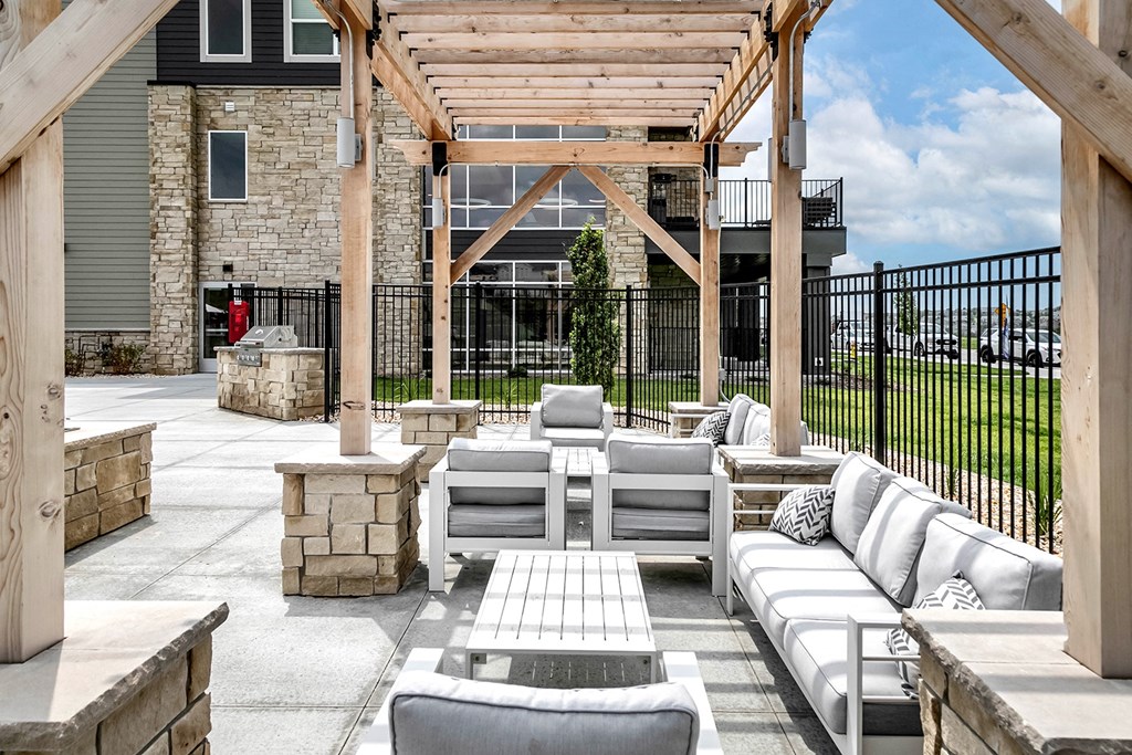 Pool patio with fire pit at The Westline at Flanagan Lake in Omaha, NE