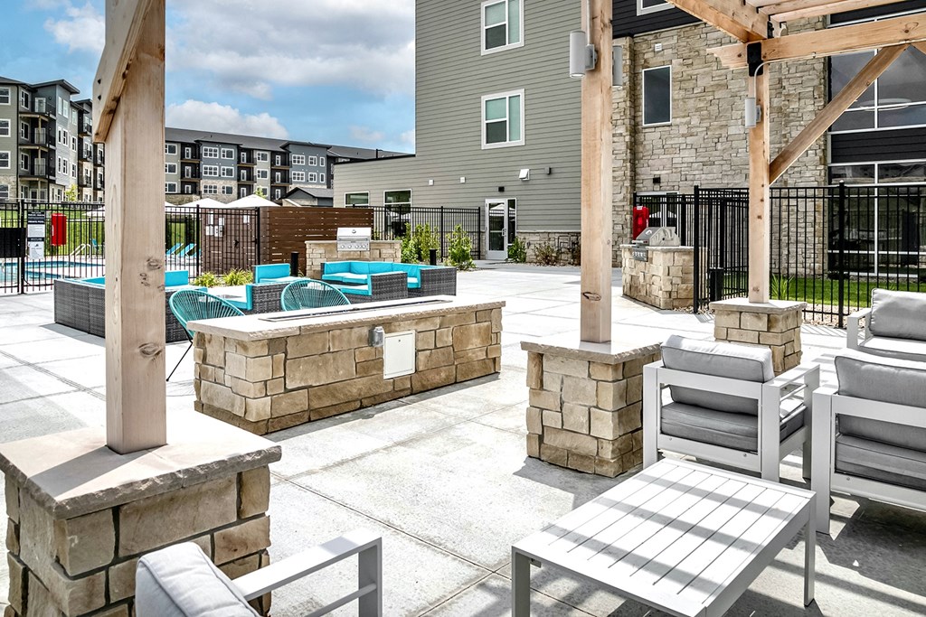 Pool patio with fire pit at The Westline at Flanagan Lake in Omaha, NE