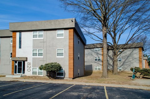 Apartment building number 820 is located in a parking lot.