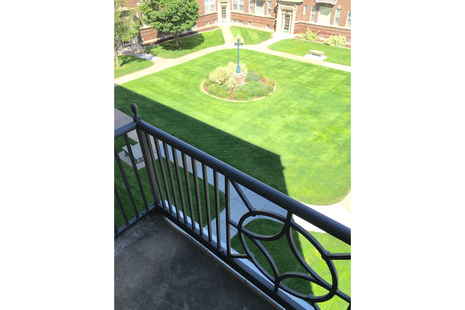 the view of the yard from the balcony