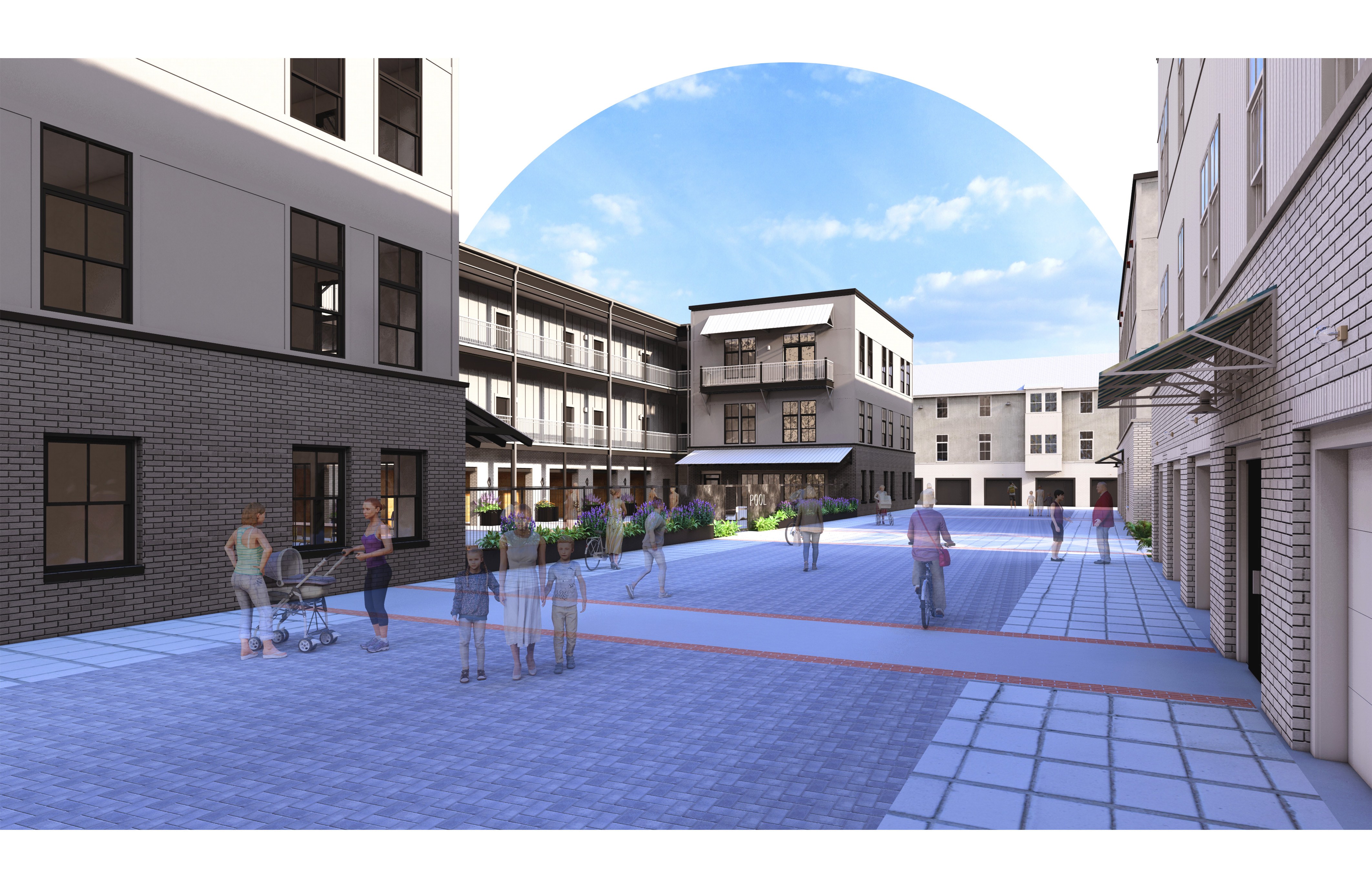 A group of people are walking around a courtyard between buildings.