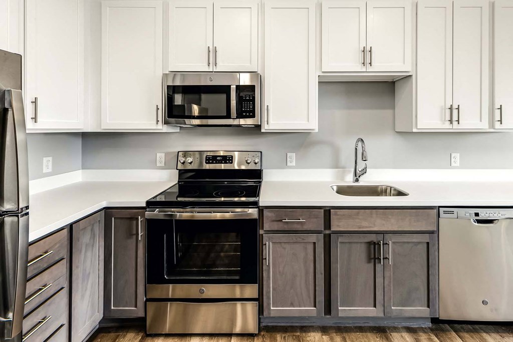 Two tone shaker cabinets with large kitchens at Echo Park in Omaha, NE
