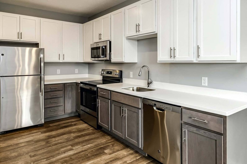 Two tone shaker cabinets with large kitchens at Echo Park in Omaha, NE