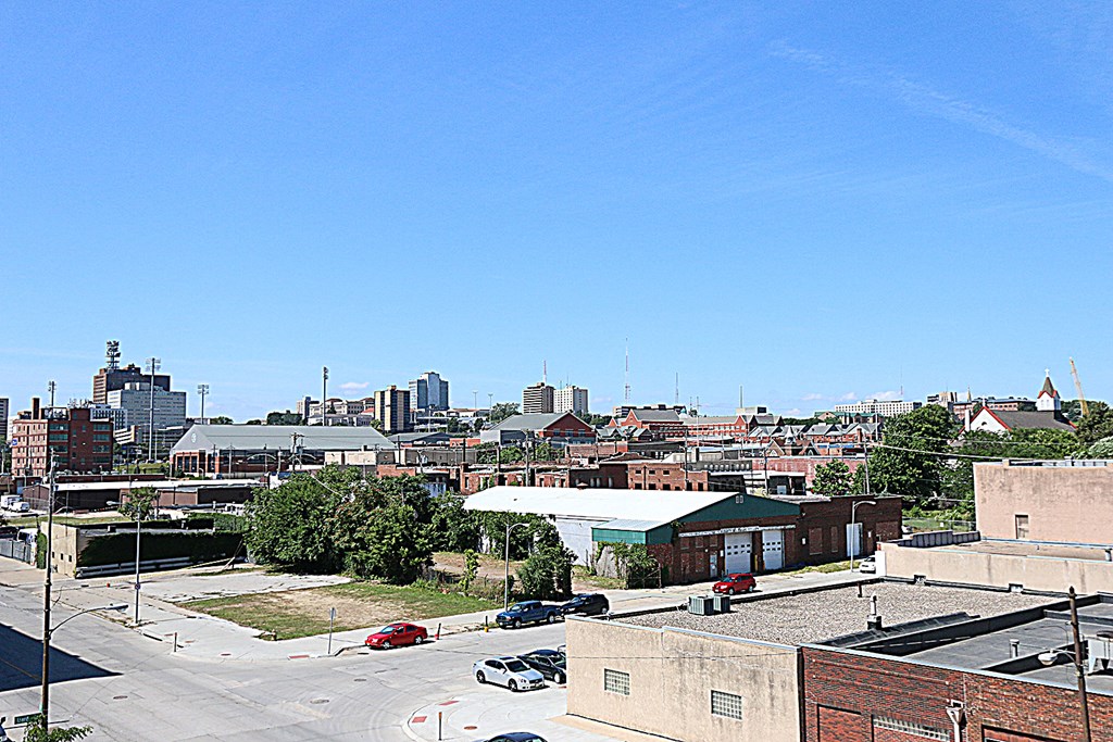 a view of the city from the roof of a building