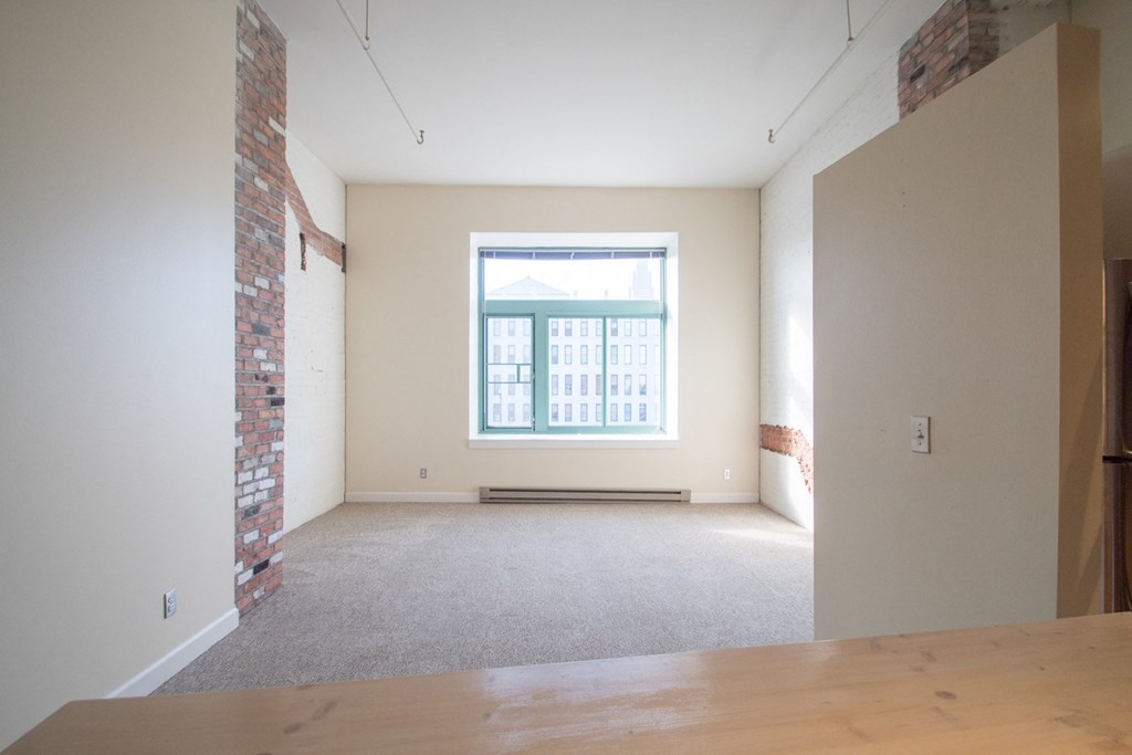 Architecturally Unique Floor Plans with Brick Accent Walls at The Greenhouse Apartments in Omaha, NE