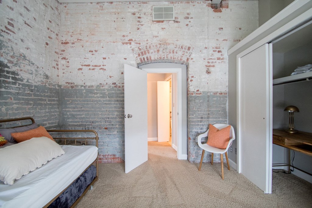 Architecturally Unique Floor Plans with Brick Accent Walls at The Greenhouse Apartments in Omaha, NE