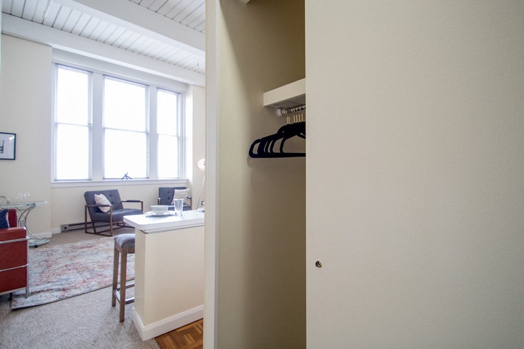 Coat closet with extra storage at The Greenhouse Apartments in Omaha, NE