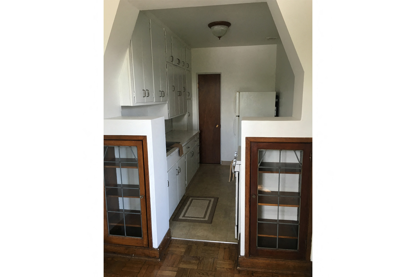 a view of the kitchen from the living room