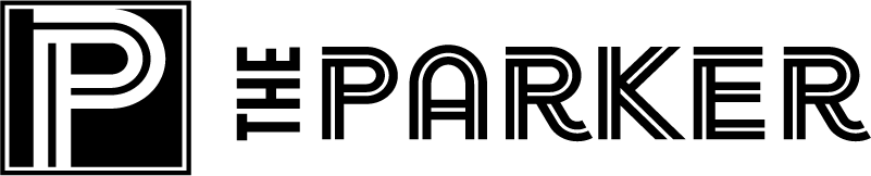The image shows a logo with the text "THE PARKER" in bold, black letters on a green background.