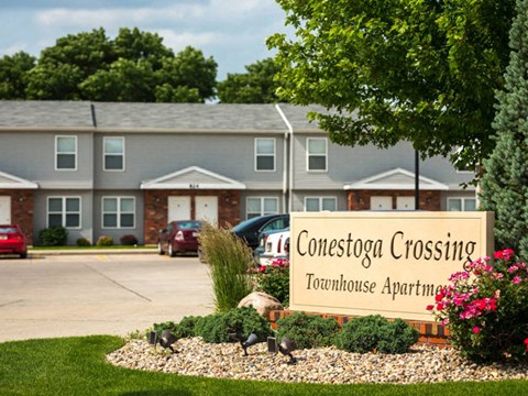 a sign in front of a building