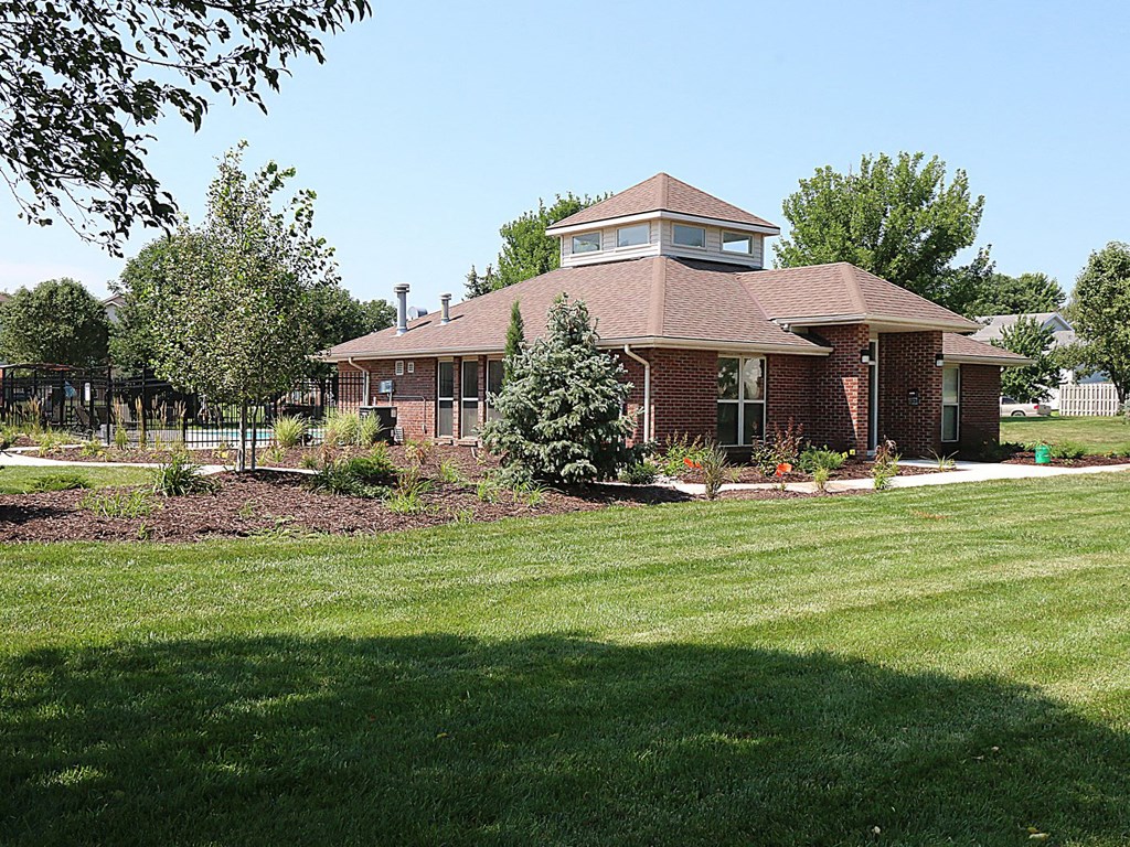 a house with a yard in front of it
