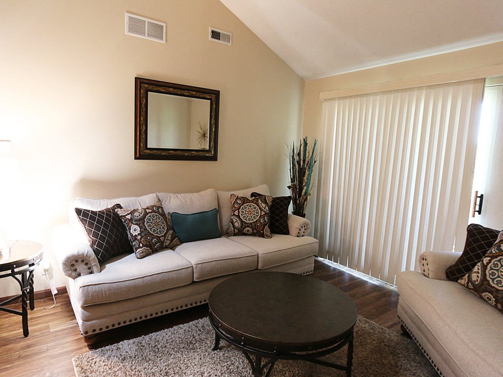 a living room with a couch and a coffee table